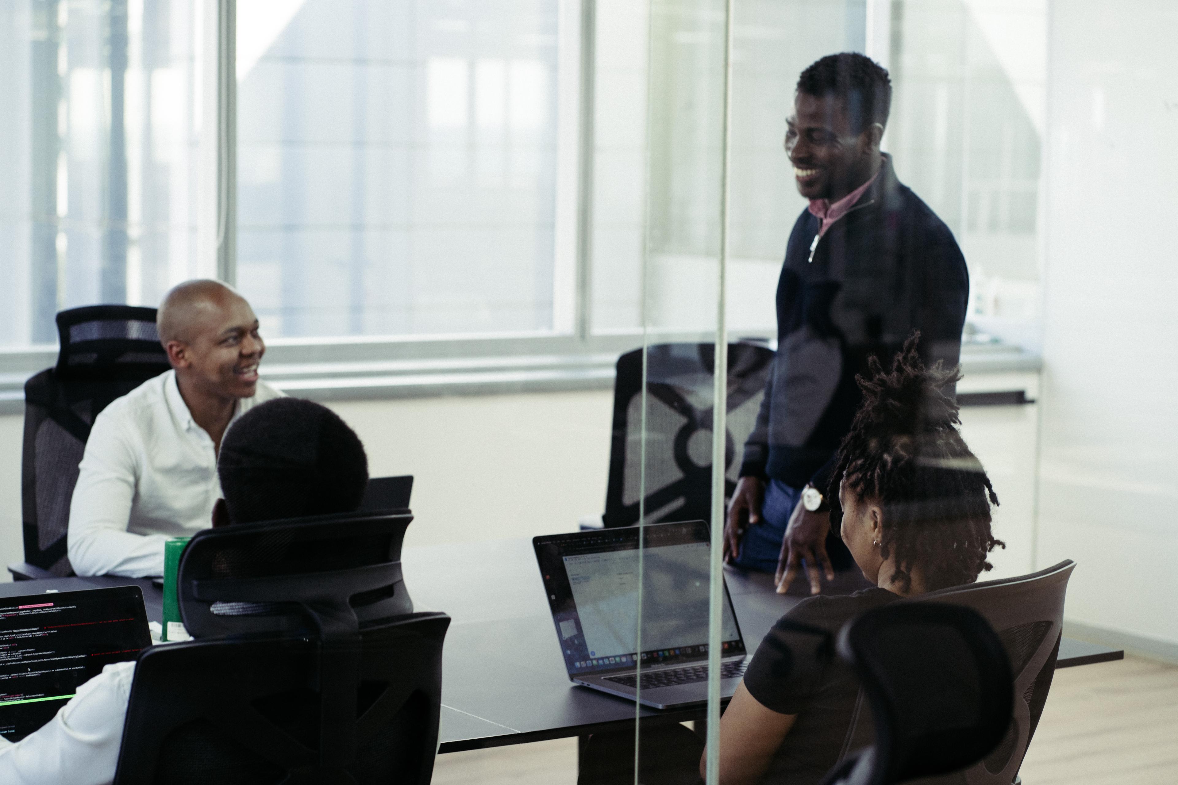 Team meeting and collaboration in modern office space